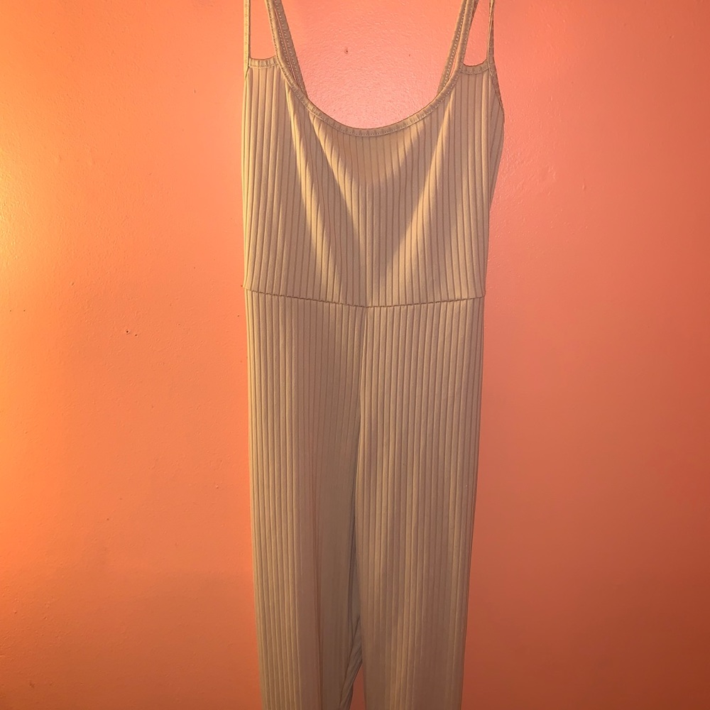 PrettyLittleThing ribbed nude jumpsuit.